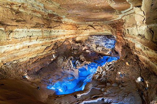 natural bridge caverns shot of cave with blue light or water
